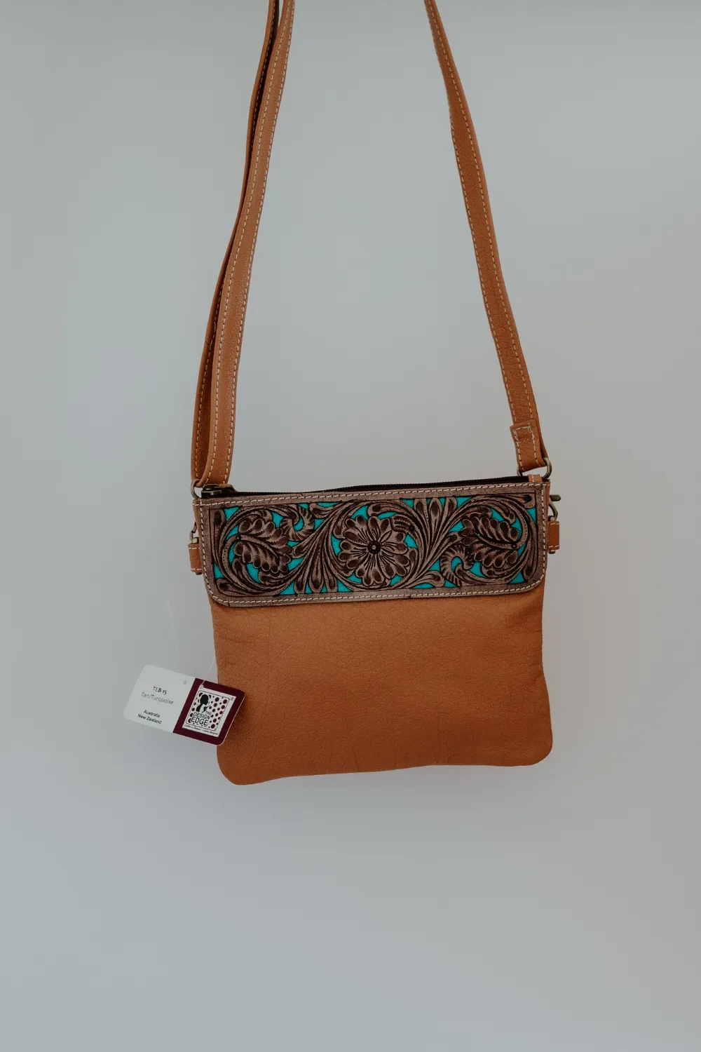 Turquoise Tooled Sling Bag