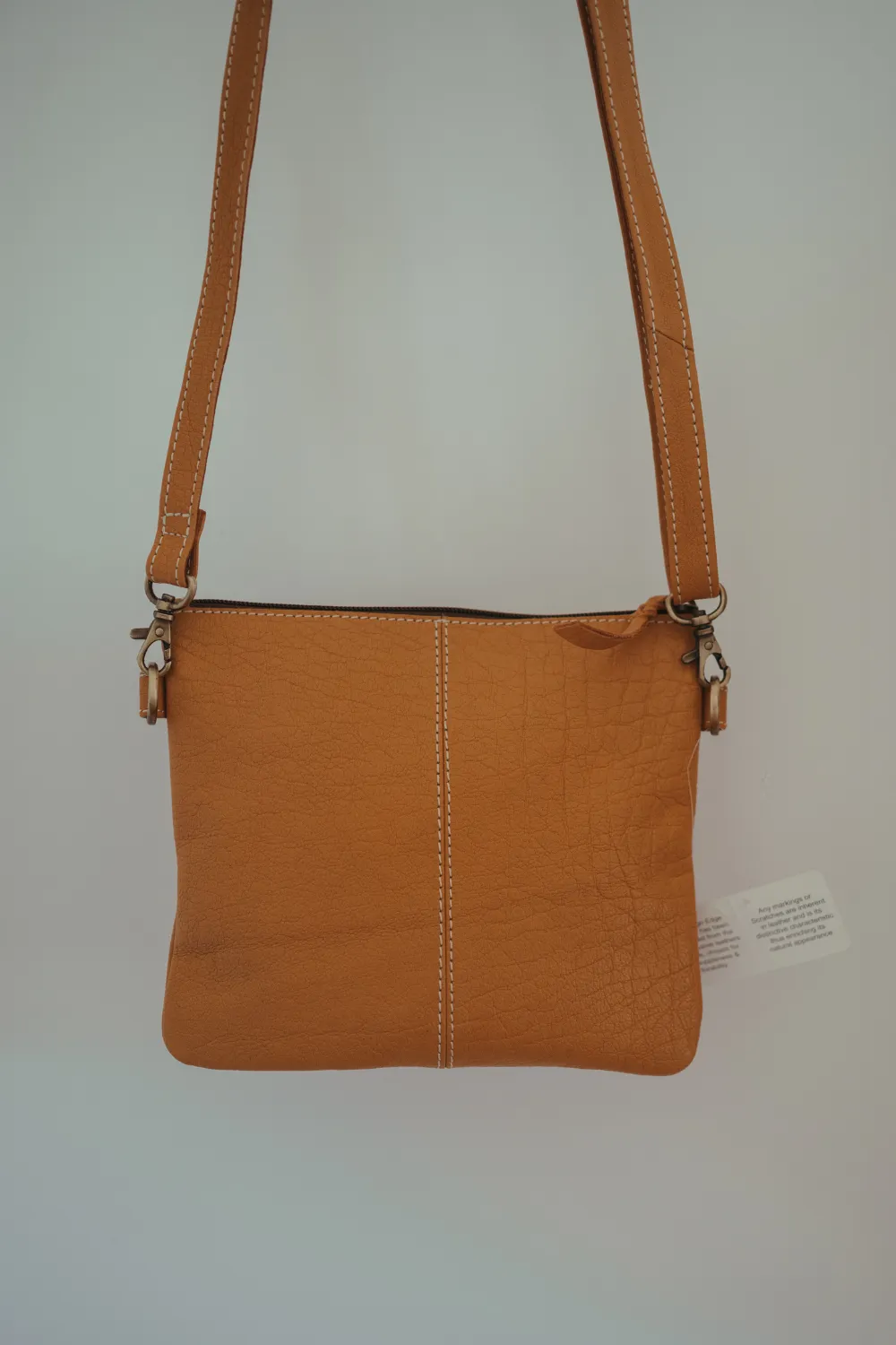Turquoise Tooled Sling Bag
